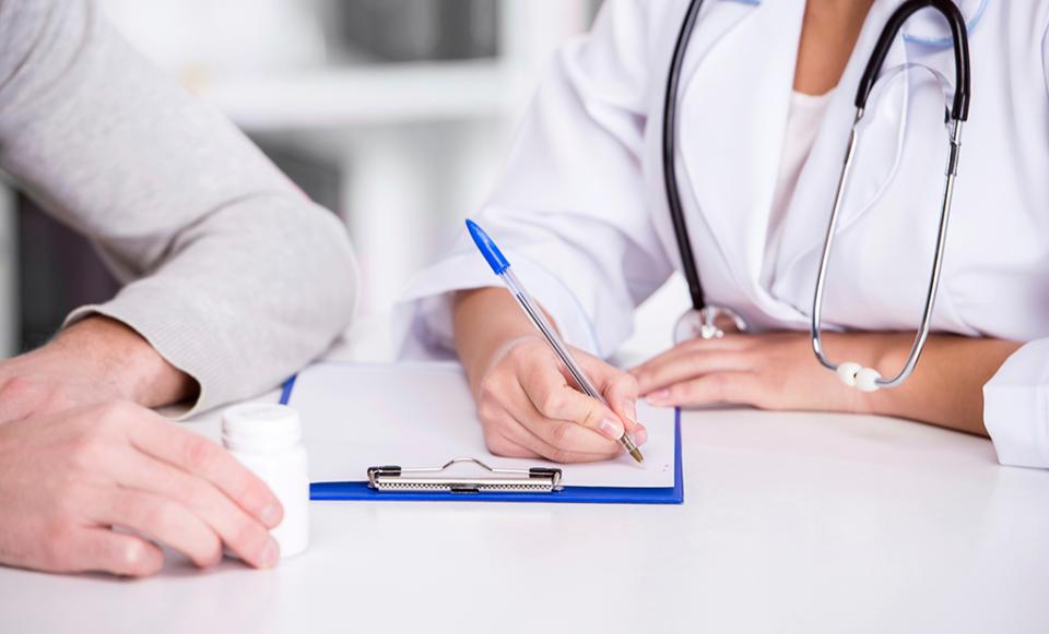 signing 529190907 1024x620 savedforweb doctor patient hospital health care