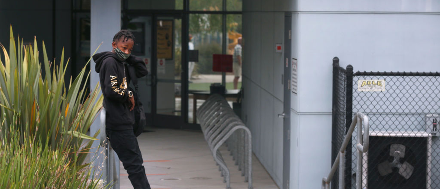 Child waiting for school during COVID-19