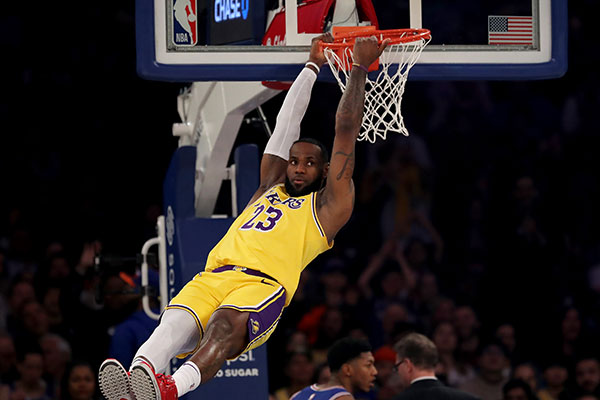 Lebron James March Madness_CQC_v2 Lebron James takes dunk shot