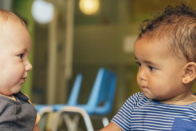 Two children play while worrying about CHIP being taken away