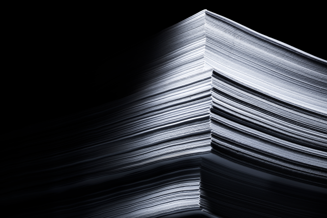 Stack of paperwork in black and white