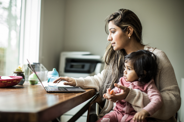 Woman and daughter on computer