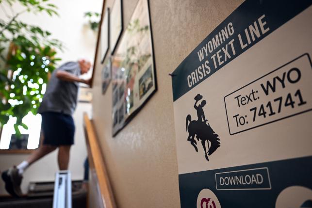 Side of a trailer in Wyoming displays crisis hotline number