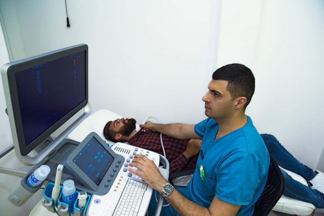 Doctor examining patient in ACO