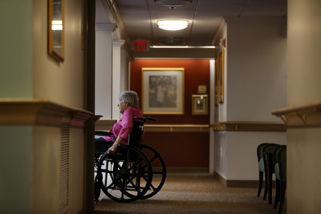 Resident in a wheelchair at an assisted living facility