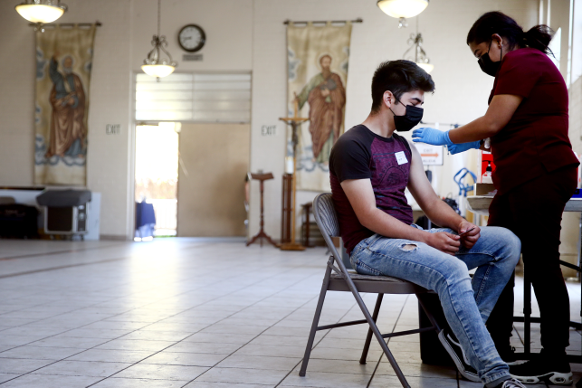 A person receiving their first dose of the COVID-19 vaccine in Los Angeles on April 9, 2021. Findings from a new study highlight the substantial impact of the U.S. vaccination program on reducing infections, hospitalizations, and deaths. Photo: Mario Tama/Getty Images