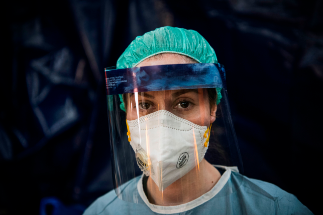 9-years-old doctor, Shayma Radi, is pictured with her personal protective equipment in a tent on the grounds of the Sophiahemmet private hospital on April 22, 2020 in Stockholm, Sweden.