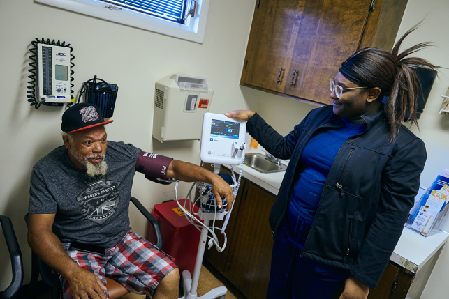 Patient has blood pressure checked in clinic