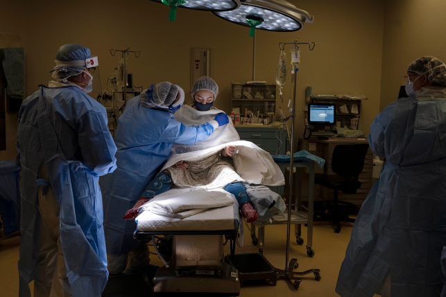 Woman prepares for caesarean section