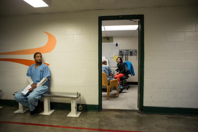 Inmate waits to be seen by a doctor