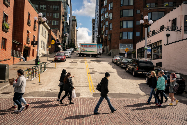 Pedestrians cross the street in Seattle
