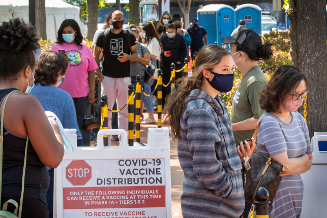 View of people waiting in line for vaccinations