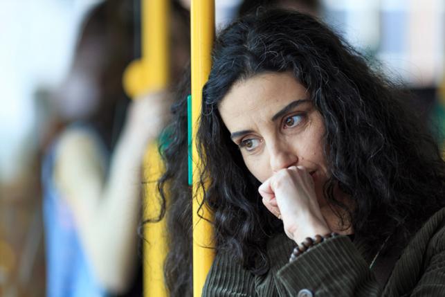 Woman on subway worries that the Affordable Care Act will go away