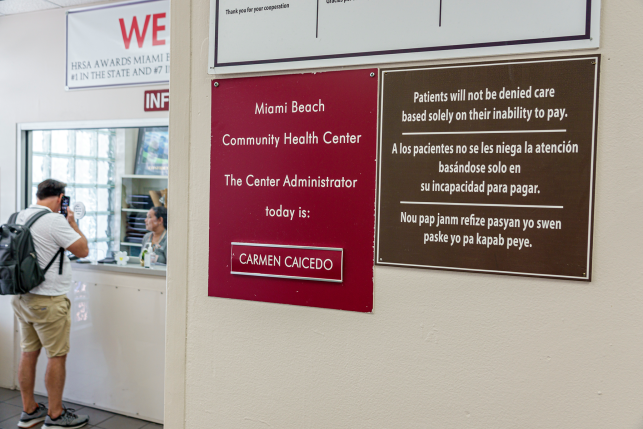 Signs and reception desk of community health clinic