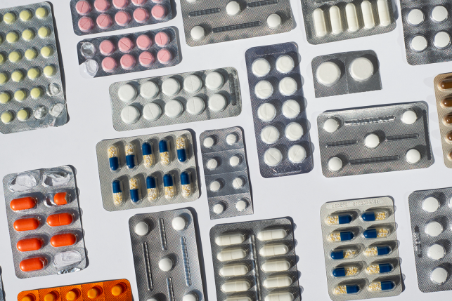 pills in pill packets on a white background