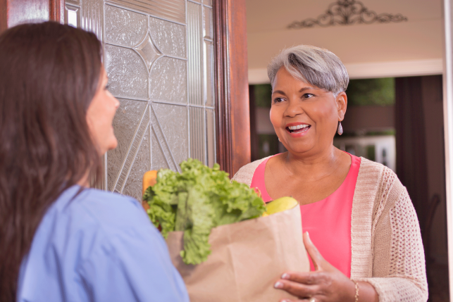 woman receiving groceries