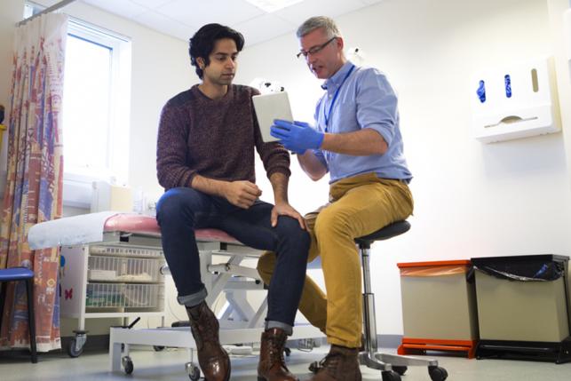 Young man getting test results