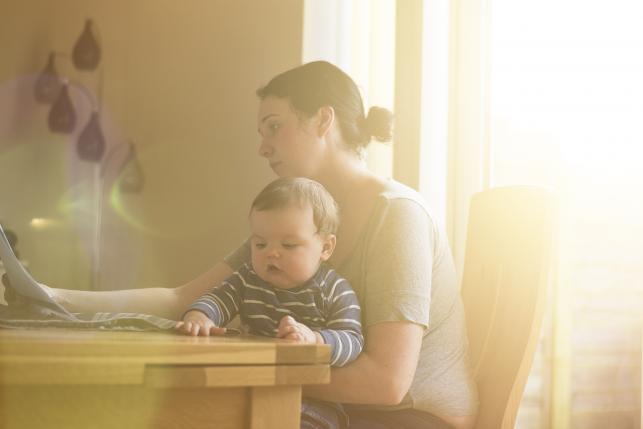 mother looking at finances