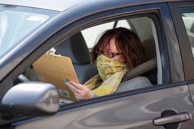 woman signing up for health insurance