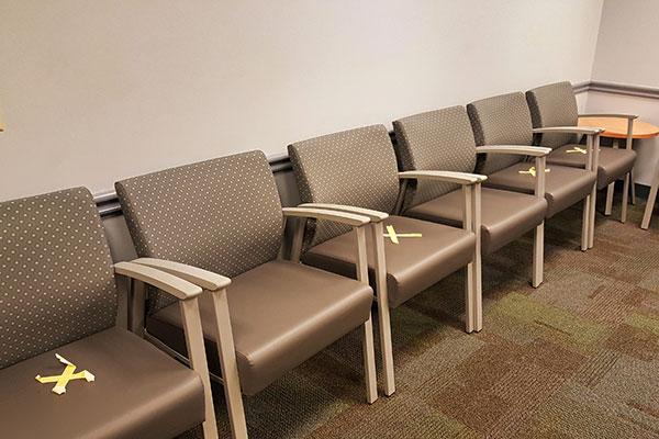 waiting room marked off to social distance