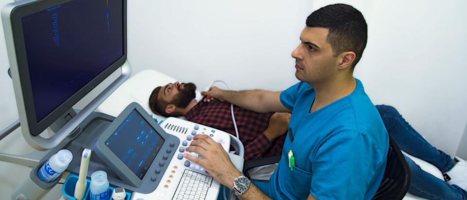 Doctor examining patient in ACO