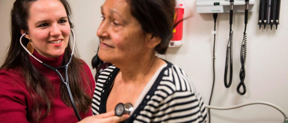 Nurse Katie Baker examines patient Mildred Arce at the Esperanza Health Center in Philadelphia, PA, on March 13, 2017. The center is located in North Philadelphia, the city with the highest rate of deep poverty people with incomes below half of the poverty line of any of the USAs 10 most populous cities, were a high rate of people do not have medical insurance coverage. DOMINICK REUTER/AFP via Getty Images