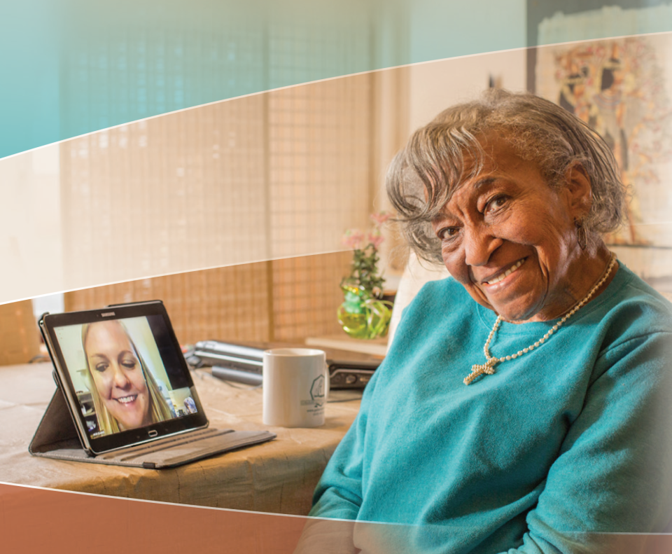 Myrna Curtis uses the tablet provided to her by MedStar Health to communicate with Palliative Medicine Clinical Pharmacist Nicki Graham.