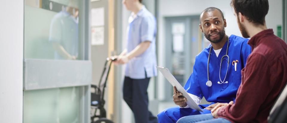 Patient and doctor in state with struggling health insurance marketplace