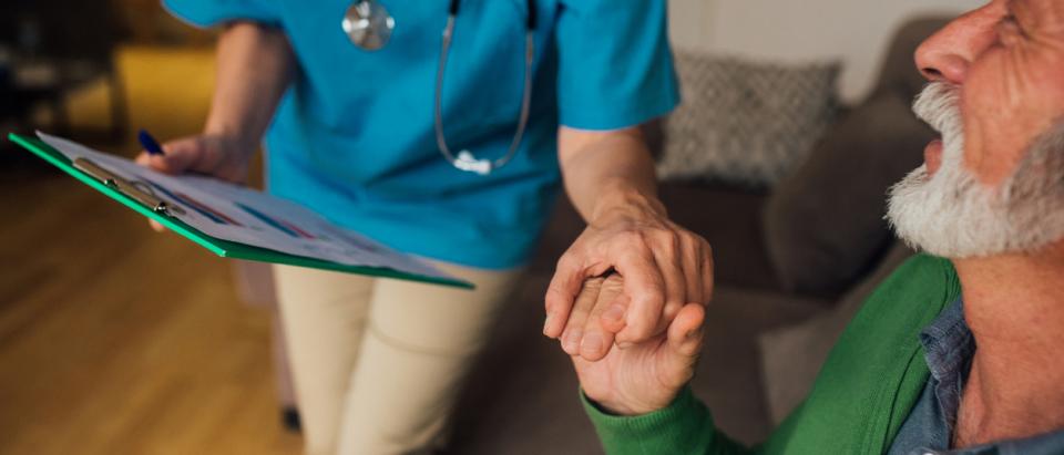 Senior man receiving long-term support services