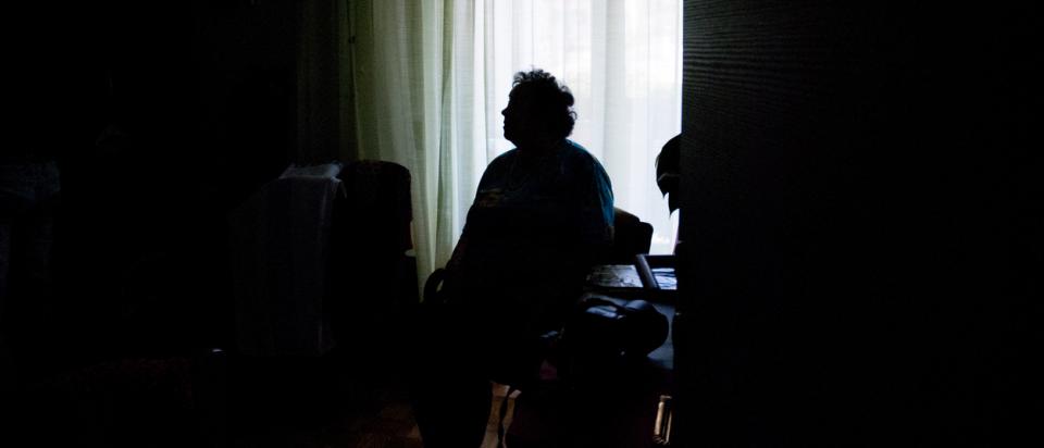 Senior woman alone at home