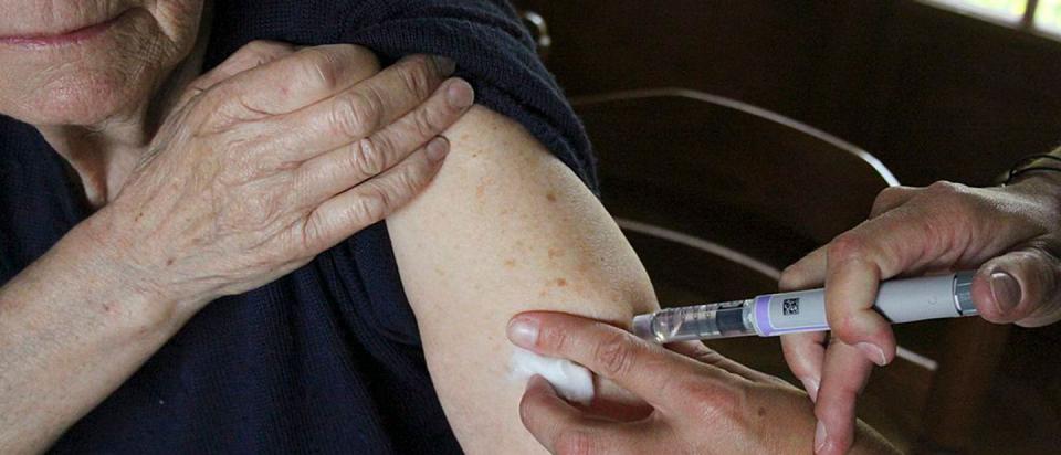 senior getting insulin injection