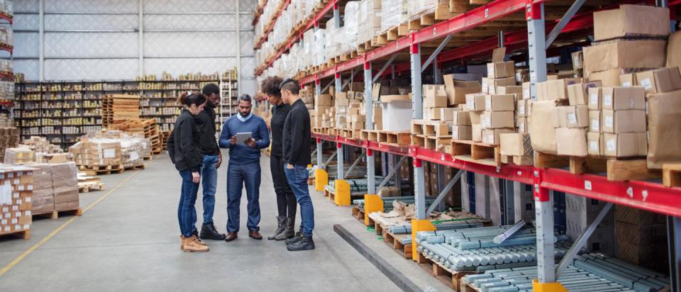 Small business meeting in warehouse