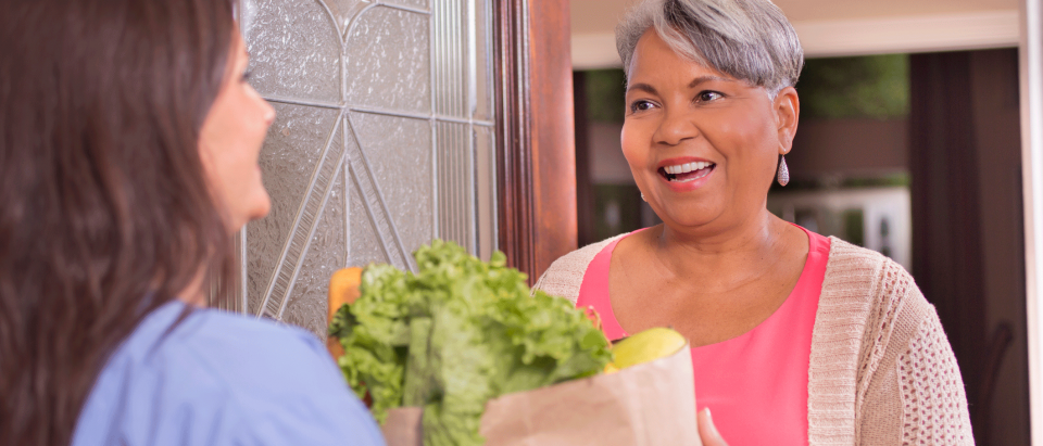 woman receiving groceries