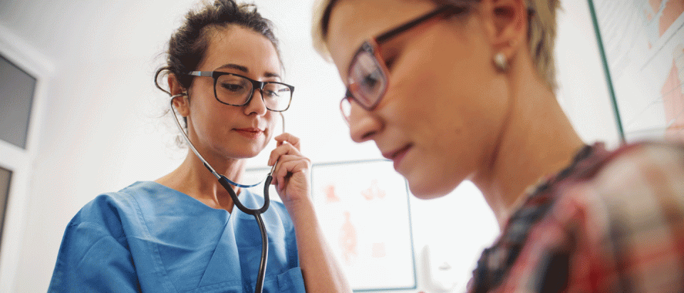 doctor examining Medicaid patient