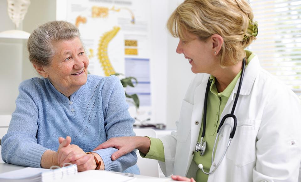 comforting 181306228 1024x620 savedforweb doctor patient hospital health care