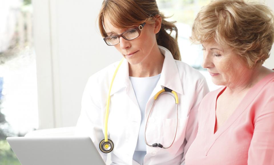 docandpatientoncomp 514344731 1024x620 Doctor patient healthcare