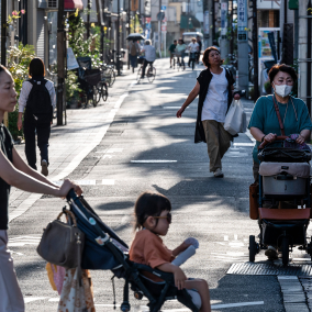 Women walk on street in Tokyo