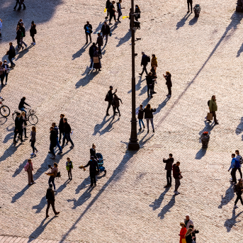 Aerial view of people walking in a square