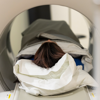 Woman in PET-CT machine