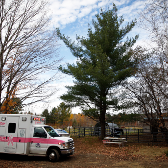 A NorthStar Ambulance stands at the ready near a farm in Industry, Maine.