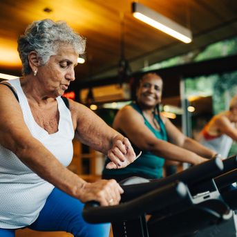Seniors on exercise equipment