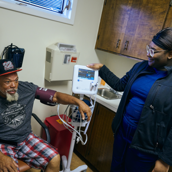 Patient has blood pressure checked in clinic
