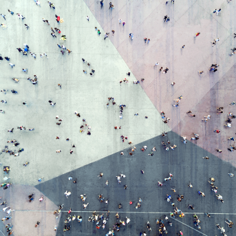 Birds eye view of people walking in a crowded square