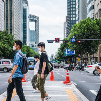 masked South Koreans walk on crosswalk