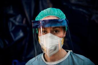 9-years-old doctor, Shayma Radi, is pictured with her personal protective equipment in a tent on the grounds of the Sophiahemmet private hospital on April 22, 2020 in Stockholm, Sweden.