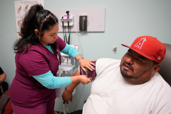 Patient gets blood pressure taken