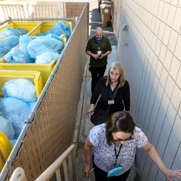 Environmental stewardship team inspecting loading docks