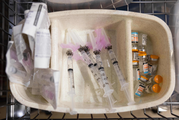 Syringes and vials of naloxone