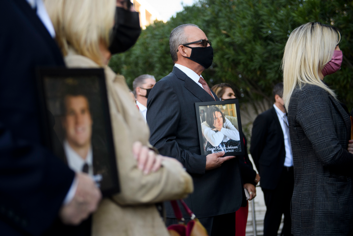 Jaime Puerta holds a portrait of his son Daniel Puerta-Johnson, who died in April 2020 at the age of 16 from a pill containing fentanyl.