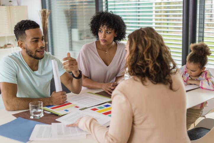 Consumer discussing health insurance choices with an agent